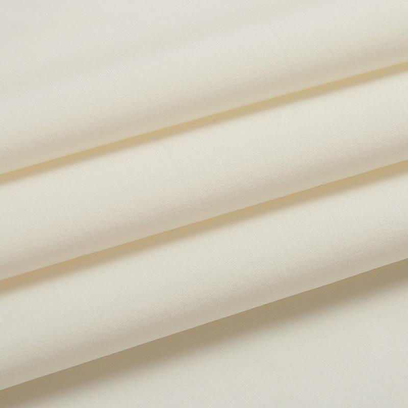 What are the characteristics of cotton poplin fabric