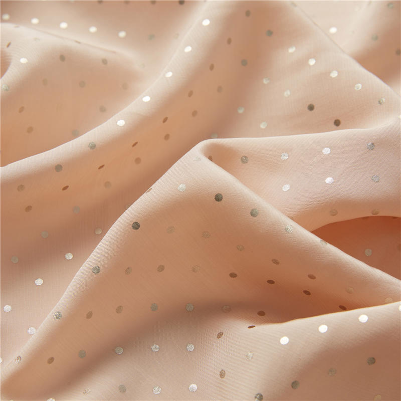 Flashing silver dots pink ground 51% rayon 49% viscose poplin shapes dot print fabric