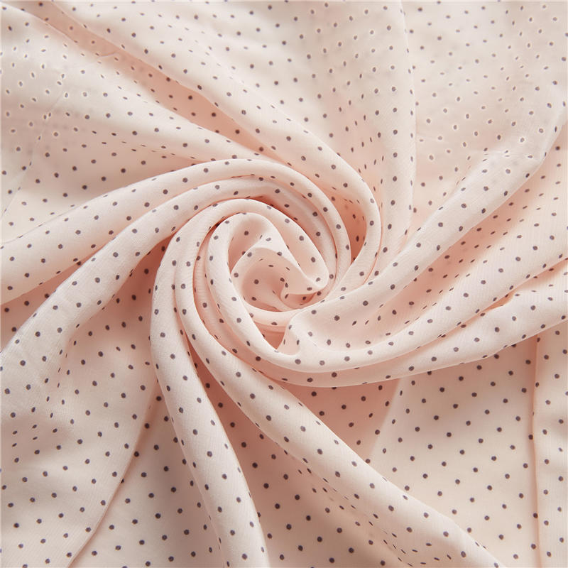 Black dots pink ground  51% rayon 49% viscose poplin silky shapes dot print fabric