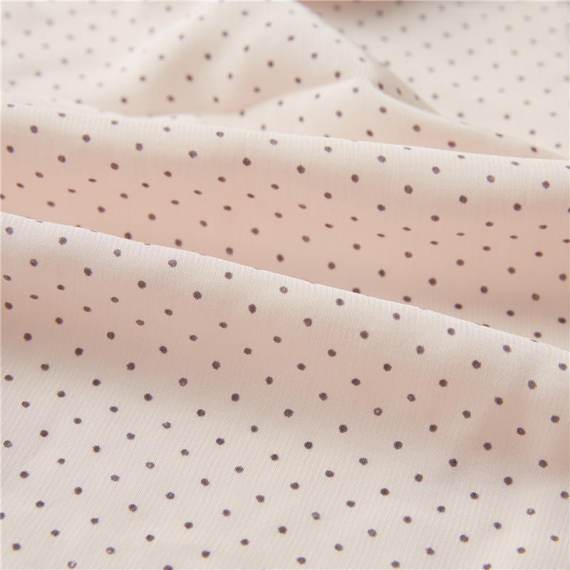 Black dots pink ground  51% rayon 49% viscose poplin silky shapes dot print fabric